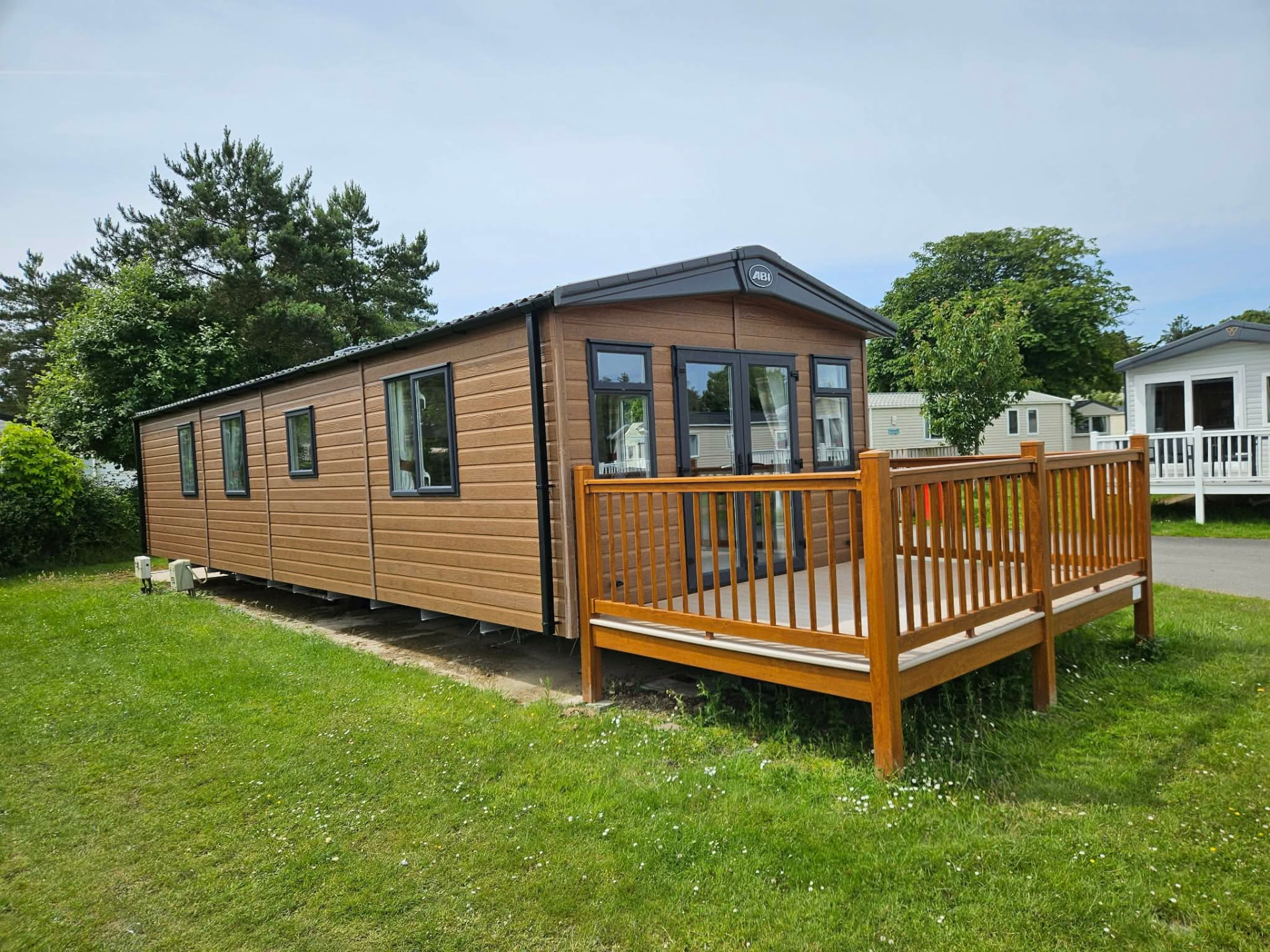 The privately owned caravan with its new decking at Hafan y Môr